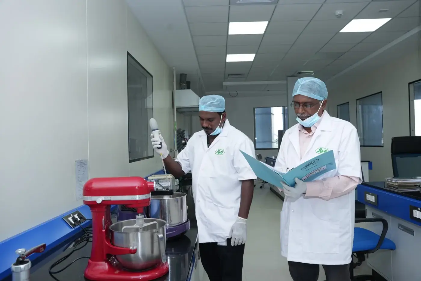 Technicians at work in the process lab